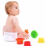 Cute Infant Boy With Toys Stock Photo