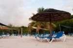 Beach Chairs And Umbrella Stock Photo