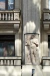 Statue Of A Male Figure On An Apartment Block In Budapest Stock Photo