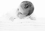 Blue Eyes Baby Boy On White Towels Stock Photo