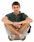 Teenage Student Sitting On Floor Stock Photo