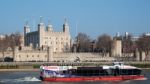 Tourist Boat Passing The Tower Of London Stock Photo