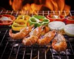 Shrimp,prawns Grilled On Barbecue Fire Stove With Chilly Onion For Seafood Meal Stock Photo