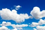 Sunny Blue Sky With White Clouds Stock Photo