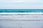 Sand Beach With Blue Ocean Stock Photo