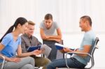 Group Of Business People Working And Discussing Together Office Stock Photo