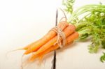 Baby Carrots Bunch Tied With Rope Stock Photo