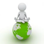 Figure Doing Meditation On Green Globe Stock Photo