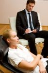 Psychiatrist Examining A Female Patient Stock Photo