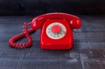 Retro Vintage Red Landline Unhang On Wooden Background Stock Photo