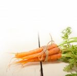 Baby Carrots Bunch Tied With Rope Stock Photo