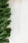 Branch Of Fir Tree,christmas Leaf On Wooden Floor Background  Stock Photo