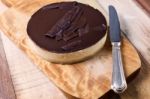 Fresh Classic Homemade Cheesecake With Dark Chocolate Topping Stock Photo