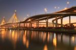 Night View Of Bhumibol Bridge In Thailand, Also Known As The Industrial Ring Road Bridge Stock Photo