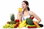 Healthy Caucasian Girl Eating Banana Stock Photo