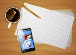 Smartphone On Desk Stock Photo