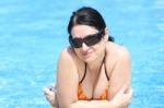 Gorgeous Woman In The Pool Stock Photo