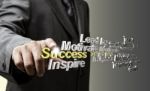 Business hand touching success word Stock Photo