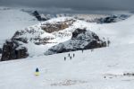 People Skiing From Sass Pordoi In The Upper Part Of Val Di Fassa Stock Photo