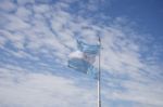 Argentina Flag On Blue Sky Stock Photo