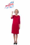 Senior Uk Supporter Waving National Flag Stock Photo