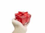 Red Gift Box In Human Hand Stock Photo