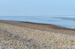 Windswept Desolate Beach At Dungeness Stock Photo