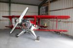 Historic Aeroplane In Hangar Stock Photo