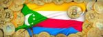 Bitcoins Gold Around Comoros  Flag And Pickaxe On The Left.3d Il Stock Photo