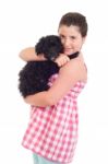 Girl Holding Dog Stock Photo