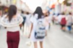 Blurred People Walking On The Street Of Old Town Stock Photo