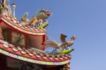 Dragon And Phoenix On The Temple Roof Stock Photo