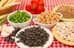 Variety Of Kitchen Ingredients With Fresh And Dried Legumes Stock Photo