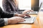 Businessman Team Working At Office Desk And Using A Digital Comp Stock Photo