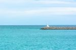 View Seascape Wit Lighthouse And Blue Sky Stock Photo