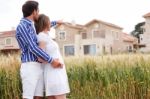 Young Romantic Couple Standing Together Stock Photo