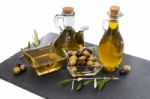 Green And Black Olives With Olive Oil Bottles Stock Photo