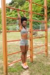 Young African Woman Doing Stretching Stock Photo