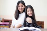 Two Asia Thai High School Student Uniform Best Friends Beautiful Girl Reading Book Stock Photo