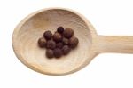 Pepper Seeds On Wooden Spoon Stock Photo