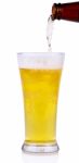 Beer Into Glass Isolated On White Background Stock Photo