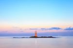 Lighthouse At Sunset Stock Photo