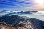 Winter Landscape With Sunset And Foggy In Deogyusan Mountains, South Korea Stock Photo