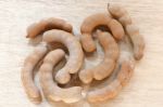 Sweet Ripe Tamarind Pods On Wood Background Stock Photo