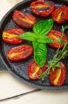 Baked Cherry Tomatoes With Basil And Thyme Stock Photo