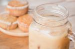 Banana Muffins And Iced Coffee Stock Photo