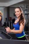 Woman Running On Treadmill Stock Photo