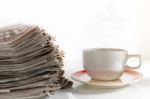 Newspapers And Coffee Stock Photo