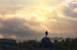 Young Man  Asia Tourist  At Mountain Is Watching Over The Misty Stock Photo