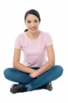 Image Of A Woman Sitting On Floor Stock Photo